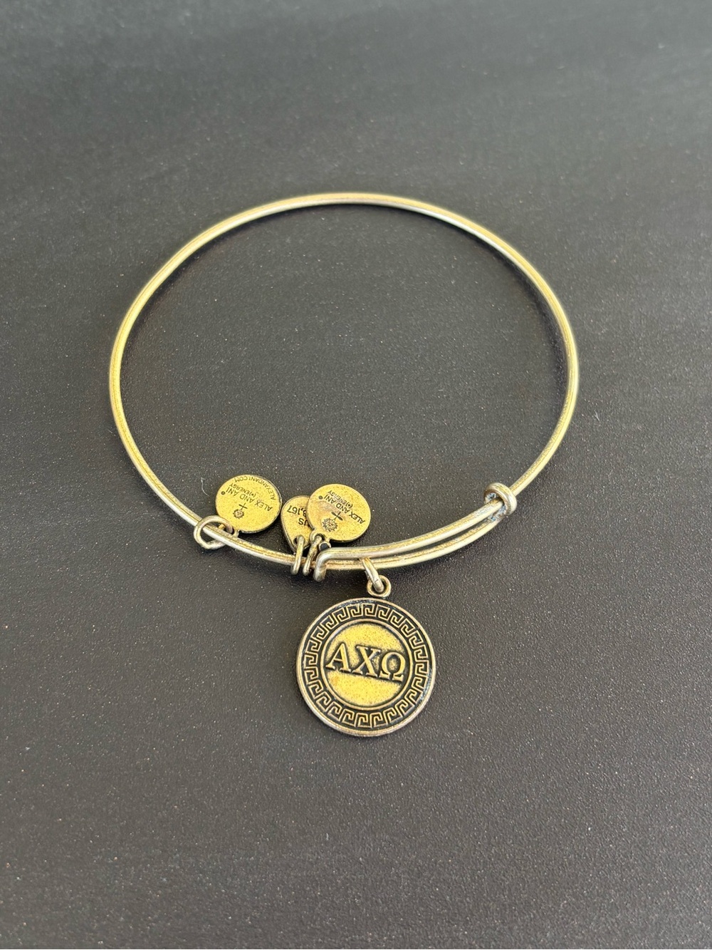 Alex and Ani Brass Toned AXΩ Greek Letter Charm Bangle Bracelet